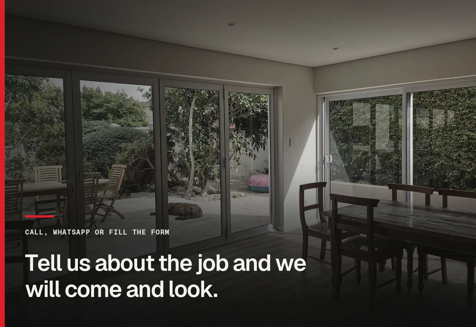 A finished open-plan room with folding glass doors onto a Cape Town garden, captioned: tell us about the job and we will come and look.